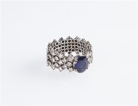  
Anello a fascia in oro, zaffiro e brillanti 
 Misura 12