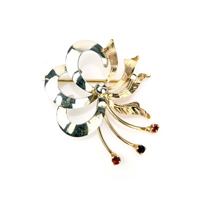  
Spilla in oro e pietre 
 Cm 3,50x3