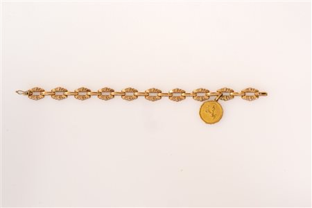 Bracciale in oro con medaglietta