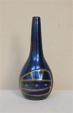 GUERRINO TRAMONTI (Faenza 1915 - 1992) Vaso in ceramica smaltata policroma....