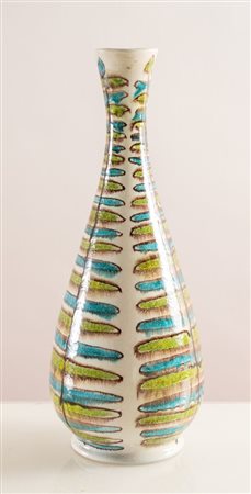 GUERRINO TRAMONTI (Faenza 1915 - 1992) Vaso in ceramica smaltata policroma....