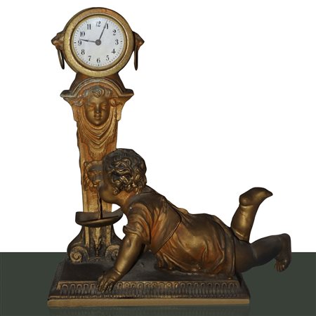 Orologio con bambino che beve alla fonte, 19° secolo