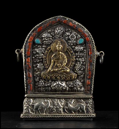 RELIQUIARIO GAU IN METALLO CON INSERTI IN PIETRA
Tibet, XX secolo