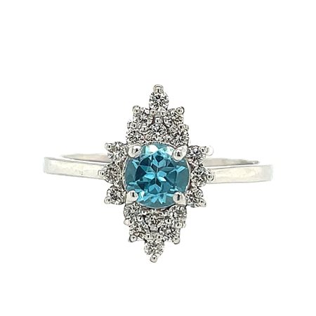 ANELLO IN ORO BIANCO 14K 2.82 GR CON TOPAZIO 0.50 CT + DIAMANTI PER 0.28 CT...