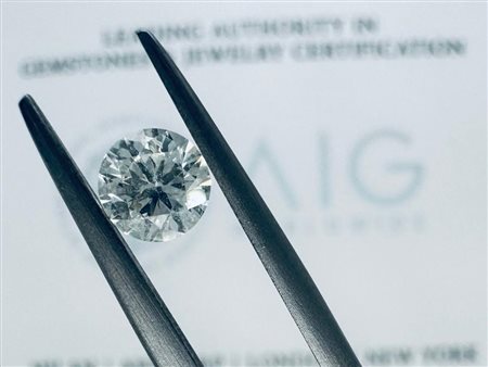 DIAMANTE 0,62 CT COLORE J - PUREZZA SI2 - TAGLIO BRILLANTE - CERTIFICATO AIG...