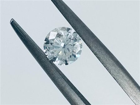 DIAMANTE 0,55 CT COLORE F - PUREZZA SI3 - TAGLIO BRILLANTE - INCISO AL LASER...