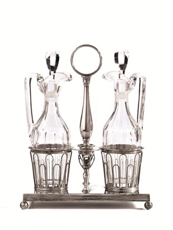 Oliera, Francia, fine sec. XIX, in argento, base rettangolare con quattro...