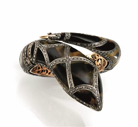 Demi-parure composta da bracciale e anello in tartaruga, oro 14 kt e argento...