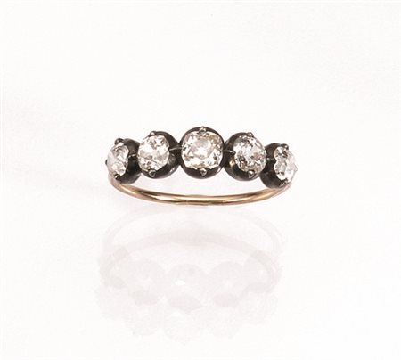 Anello in argento, oro giallo e diamanti ad una fila di cinque brillanti...