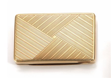 Scatola in oro giallodi forma rettangolare, interamente incisa a motivi...