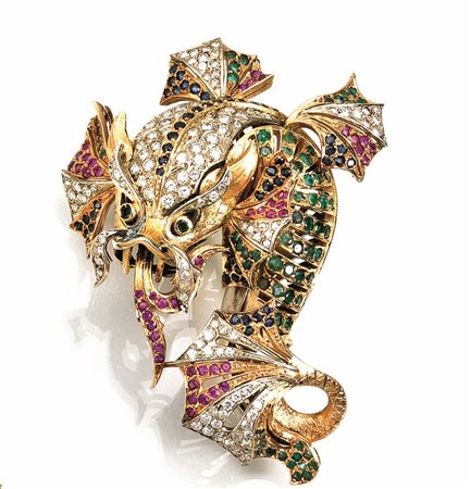 Spilla in oro giallo, oro bianco, smeraldi, rubini e diamanti modellata come...