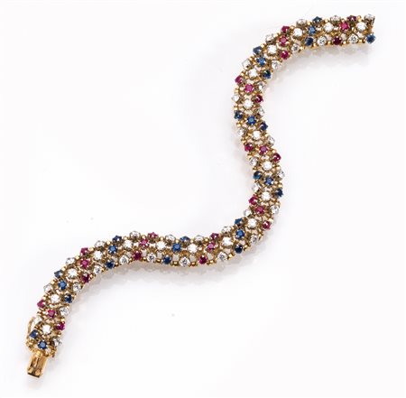 Bracciale in oro giallo, oro bianco, zaffiri, rubini e diamantimontatura...