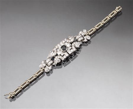 Bracciale in oro bianco, oro giallo , diamanti e zaffiroparte centrale di...