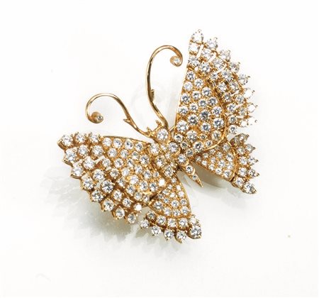 Spilla in oro giallo e diamanti modellata come una farfalla, il corpo...