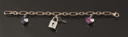 Bracciale in oro rosa, oro bianco, diamanti, rubini e zaffirirealizzato ad...