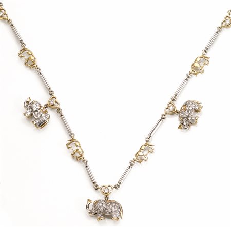 Collana girocollo in oro giallo, oro bianco e diamantirealizzata ad una fila...