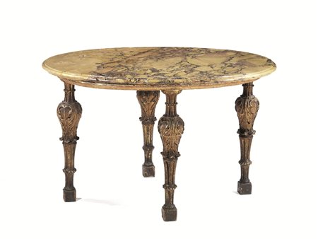 Piano ovale in marmo giallo di Siena, sec. XVIII, montato su quattro gambe...