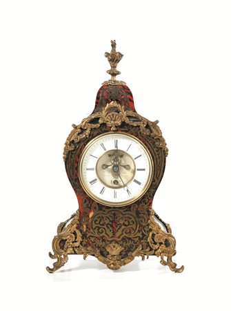 Orologio da tavolo, sec. XX, cassa sagomata in legno e metallo dorato in...