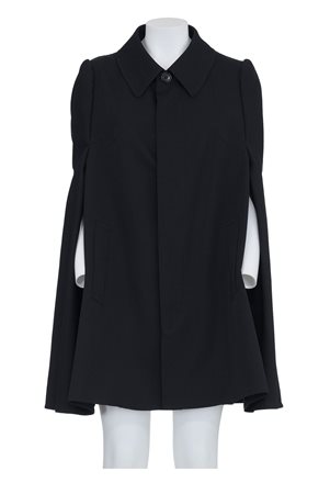 JUNYA WATANABE Iconic cape with anatomical flared back DESCRIPTION: Iconic...