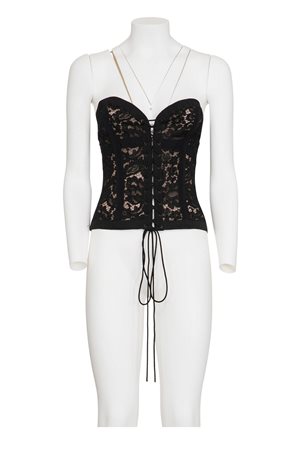 YVES SAINT LAURENT Lace and silk corsage with whalebones DESCRIPTION: Black...