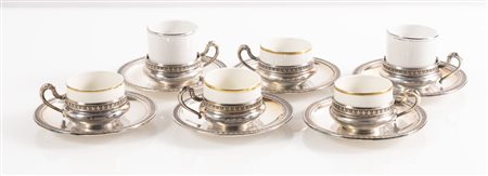 Vercelli, XX secolo. Lotto composto da sei portatazzine e piattini in argento 800.