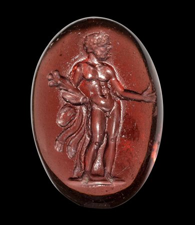 A FINE GREEK GARNET INTAGLIO. STANDING HERCULES. 