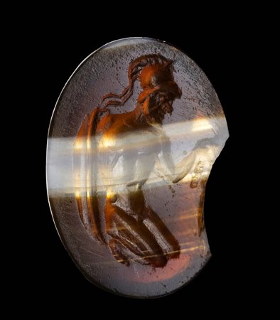 A LATE ITALIC BANDED AGATE INTAGLIO. WARRIOR.