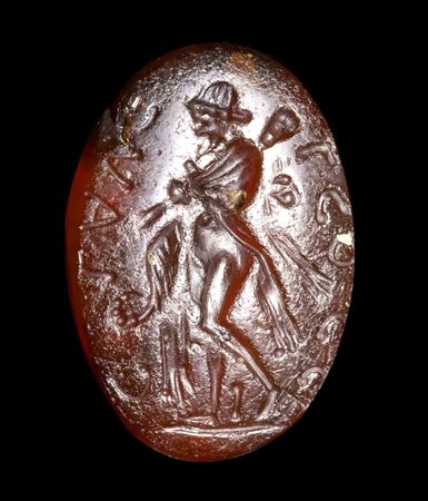 AN ITALIC CARNELIAN INTAGLIO. OMPHALE WITH INSCRIPTION. 