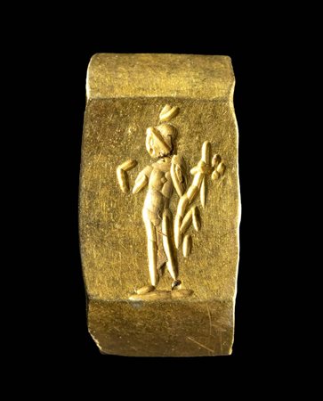 A ROMAN GOLD RING FOR A CHILD WITH THE ENGRAVED BEZEL. HARPOCRATES. 