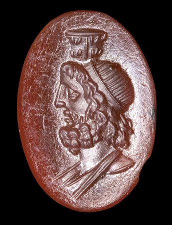 A ROMAN CARNELIAN INTAGLIO. BUST OF JUPITER. 