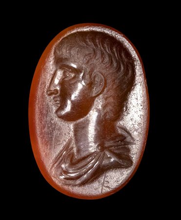 A ROMAN CARNELIAN INTAGLIO. DRAPED PORTRAIT OF A YOUTH. 