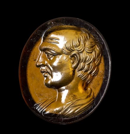 A FINE ROMAN GARNET INTAGLIO. MALE PORTRAIT. 