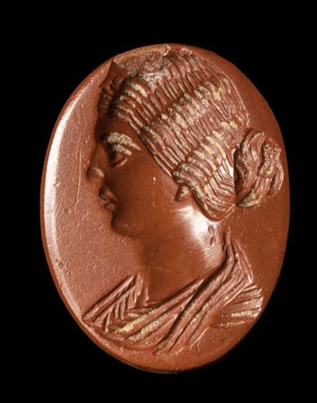 AN EASTERN ROMAN RED JASPER INTAGLIO. PORTRAIT OF A MATRONA. 
