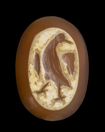 A LATE ROMAN BURNT AGATE INTAGLIO. EAGLE.