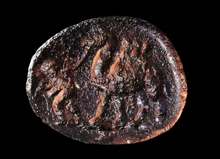 AN EASTERN MEDITERRANEAN GLASS INTAGLIO. EROS PULLING A DROMADERY.