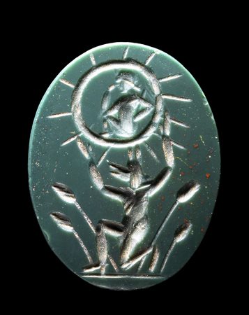 A ROMAN MAGICAL BLOODSTONE INTAGLIO. HARPOKRATES AND ANUBIS. 
