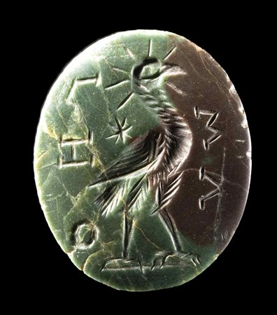 A ROMAN GNOSTIC GREEN AND BROWN JASPER INTAGLIO. PHOENIX. 