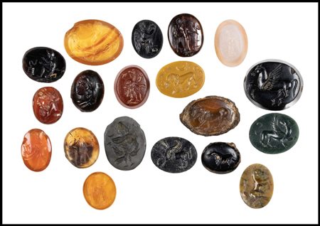 A LOT OF 19 AGATE, JASPER, CHALCEDONY INTAGLIOS. VARIA.