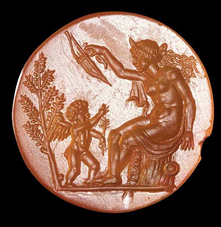 A POSTCLASSICAL CARNELIAN INTAGLIO. VENUS PLAYING WITH EROS. 