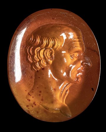 A POSTCLASSICAL CARNELIAN INTAGLIO. MALE PORTRAIT. 