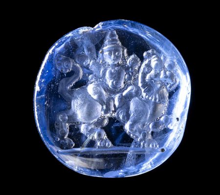 A RARE UNHEATED CEYLON SAPPHIRE INTAGLIO. KRISHNA RIDING A YALI. 