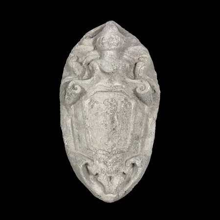 Antico stemma in pietra con il blasone della famiglia Falzacappa, cm. 64x40...