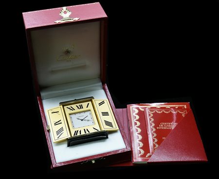 PENDULETTE TRIPTYQUE, LE MUST DE CARTIER, METALLO DORATO E ONICE, ANNI ﾑ90...