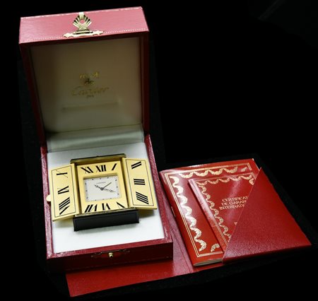 PENDULETTE TRIPTYQUE, LE MUST DE CARTIER, METALLO DORATO E ONICE, ANNI ﾑ90...