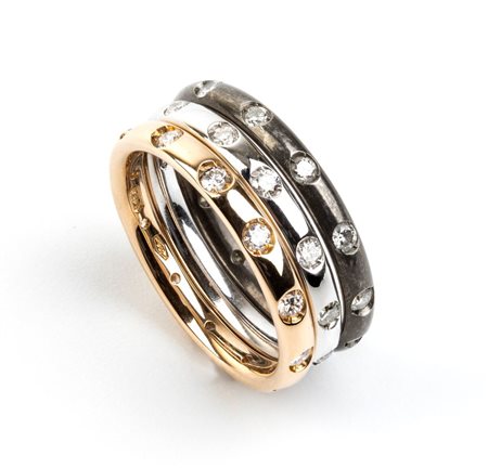 POMELLATO, collezione Lucciole: anelli in oro titanio e diamanti