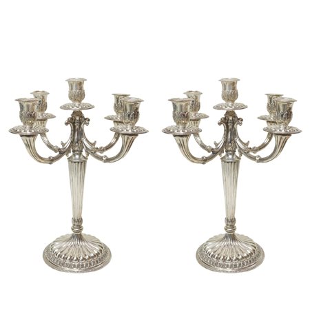 Coppia di candelieri in argento