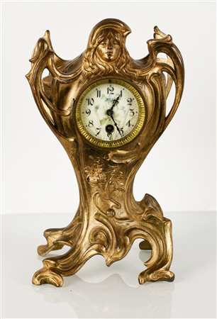  
Orologio da appoggio Liberty floreale francese.  
 altezza cm 39