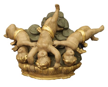  
Mensola in legno intagliata, dipinta e dorata con tre putti 
 cm 42x60x26