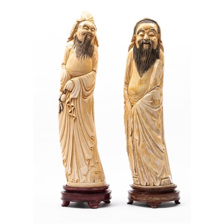 MANIFATTURA ORIENTALE XIX SECOLO, Coppia di sculture 'Saggi'