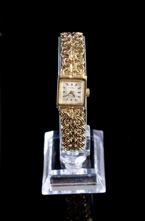OROLOGIO DA POLSO IN ORO GIALLO Orologio per signora in oro bianco 14K. Cassa...